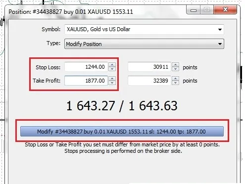 The Modify Position window of the MetaTrader terminal, editing the Stop Loss and Take Profit of a XAU/USD trade
